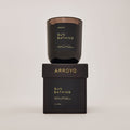 Sun Bathing Black Glass Candle 10 oz